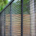 What Are the Best Fence Materials for Windy Conditions?