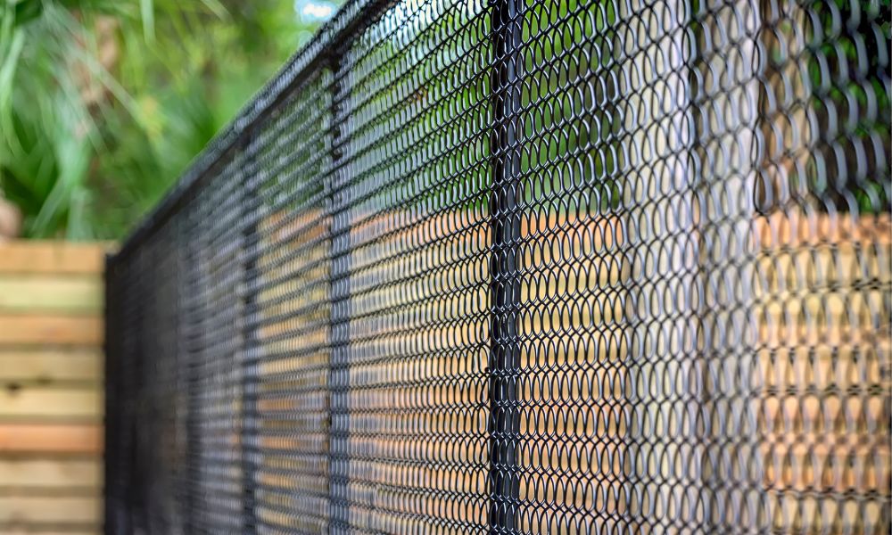 What Are the Best Fence Materials for Windy Conditions?